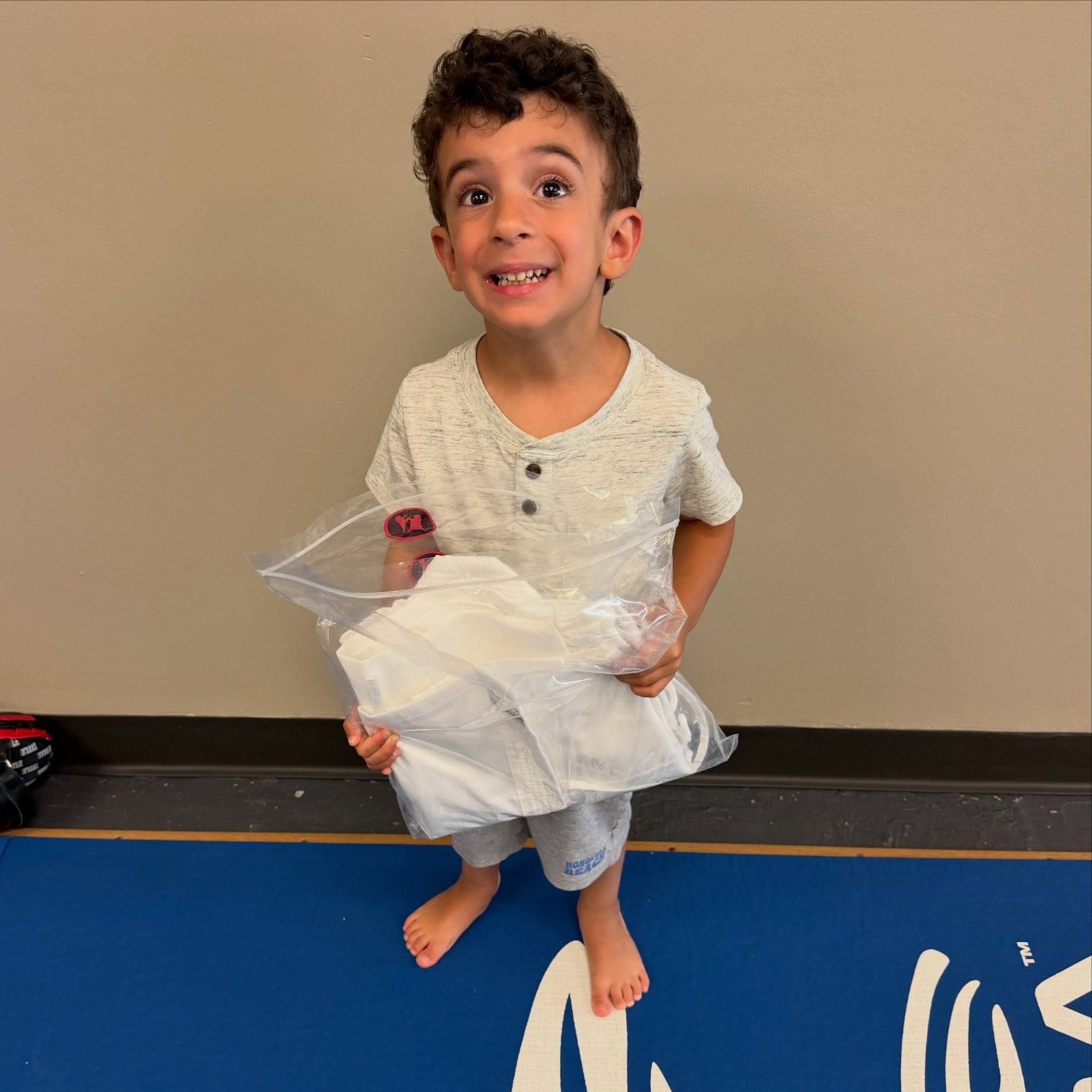 A Is Your Preschooler student smiling proudly after class at Master Curry Karate Jujutsu Ryu in Staten Island
